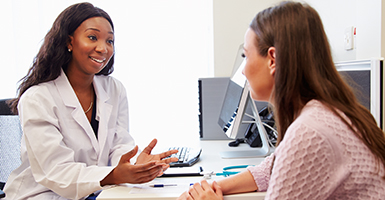 female-doctor-talking-with-female-patient